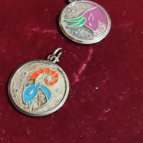 Zodiac Aries and Taurus enamel necklace set like new