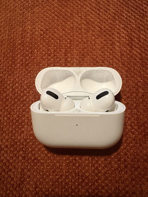 AirPods Pro Gen 1 used with wireless charger gift