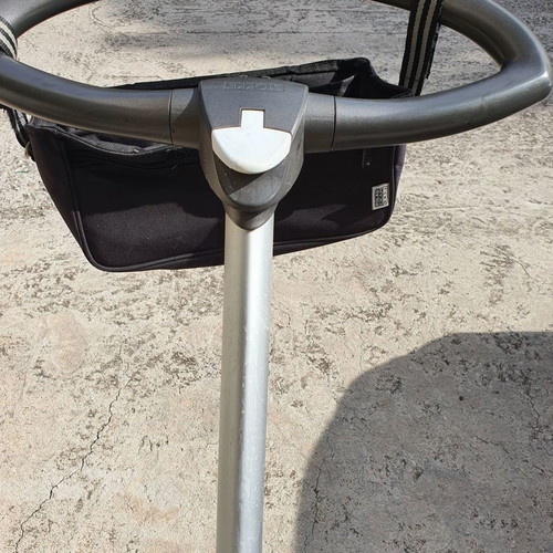 Stokke Xplory stroller used with port bebe, footmuff, bag, umbrella, mosquito net, rain cover