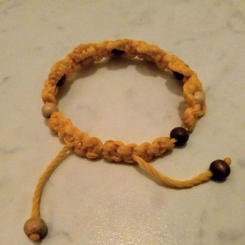 Handmade bracelet like new with yellow wooden beads
