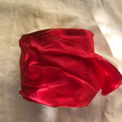 2 rolls of ribbons new in rose and fuchsia shades
