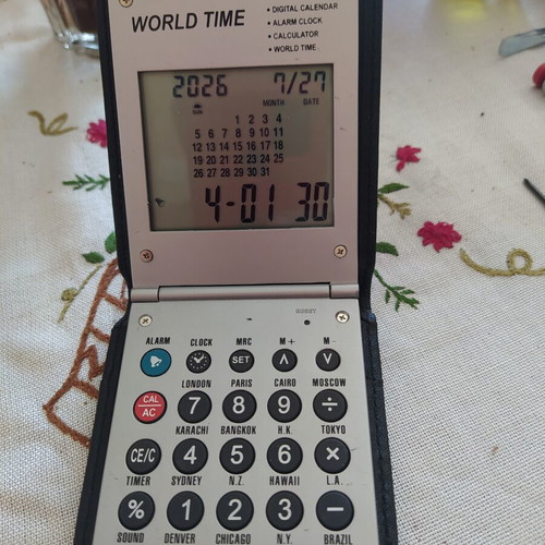 Number machine with world time, calendar, alarm clock, new