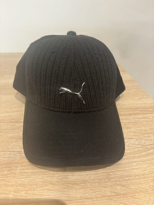 Puma black cap with metal logo