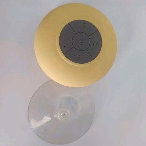 Bluetooth waterproof speaker yellow with detachable suction cup and charging cable