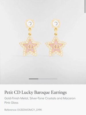 Dior earrings used, small star-shaped, gold color