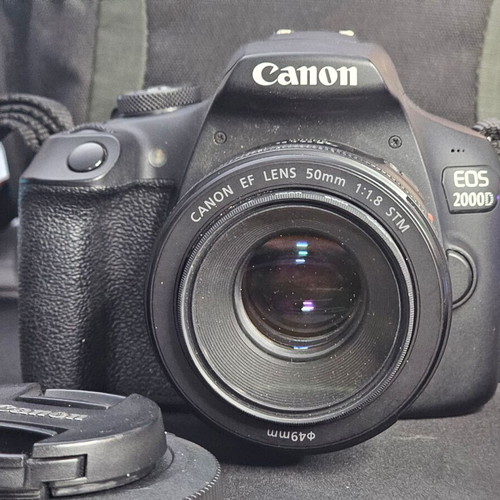 Canon EOS 2000D DSLR camera kit like new with 50mm f/1.8 STM and 18-55 IS lenses