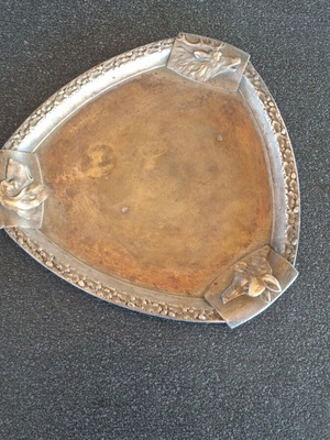 Bronze triangular tray used