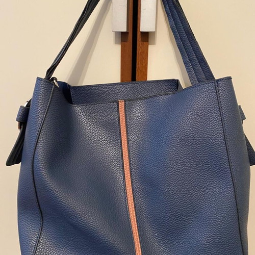 Blue shoulder bag used with brown details