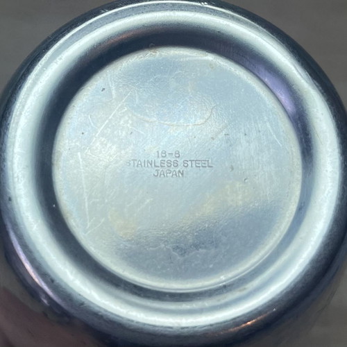 Cocktail shaker and jigger used, stainless steel
