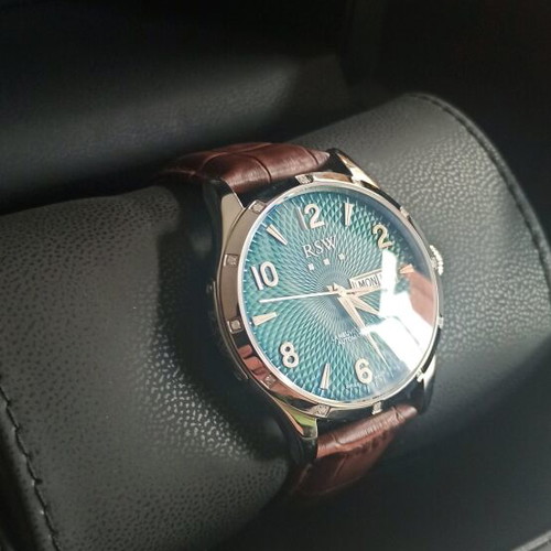 RSW La Neuveville automatic watch new, 12 diamonds, green dial