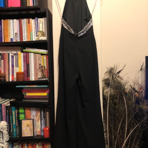 Black one-piece jumpsuit like new with sequin details