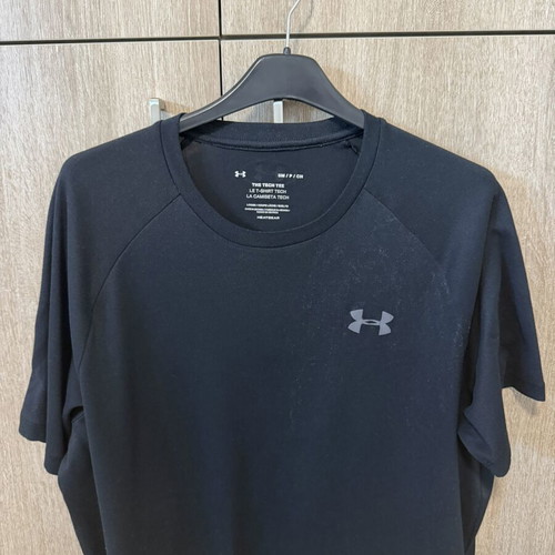 Under Armour sports shirts used, sizes Small and Medium, black and turquoise