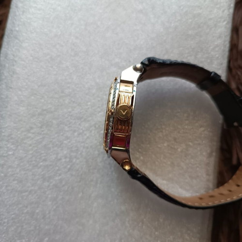 Vogue watch used with white dial and black leather strap