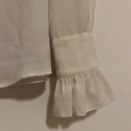 Secret white shirt medium used with ruffle sleeves