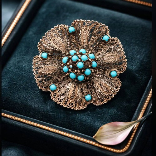 Vintage silver brooch used with turquoise stones