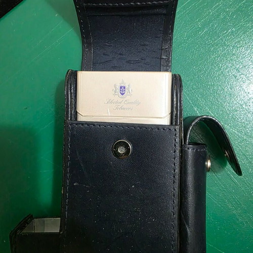 Leather tobacco case with silver frame and compartments