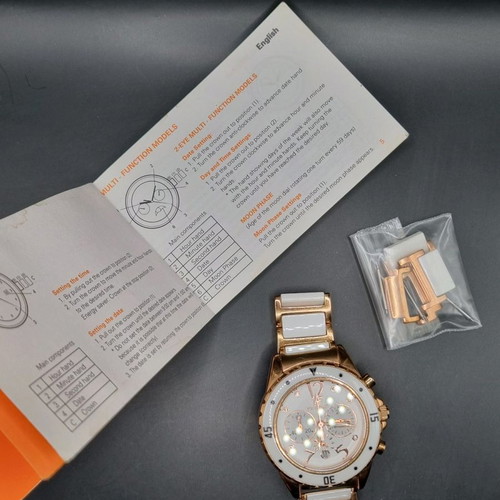 Folli Follie women's watch used, ceramic and stainless steel