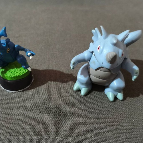 Pokemon Heracross and Rhydon figures like new