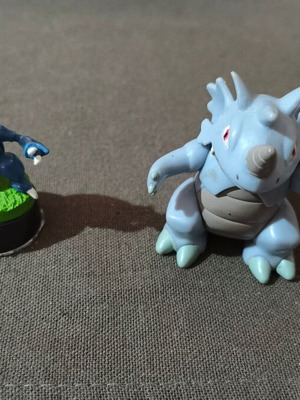 Pokemon Heracross and Rhydon figures like new