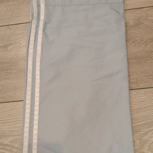 Adidas vintage track pants ice blue with white stripes, used