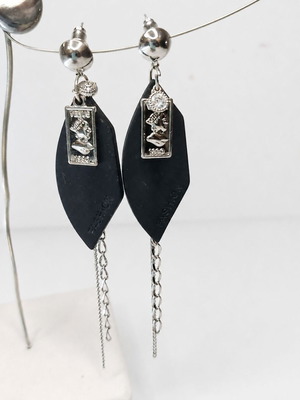 Statement earrings with black base and silver chains like new