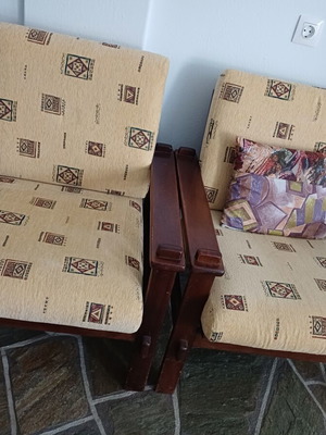 Set of two vintage wooden armchairs with fabric upholstery