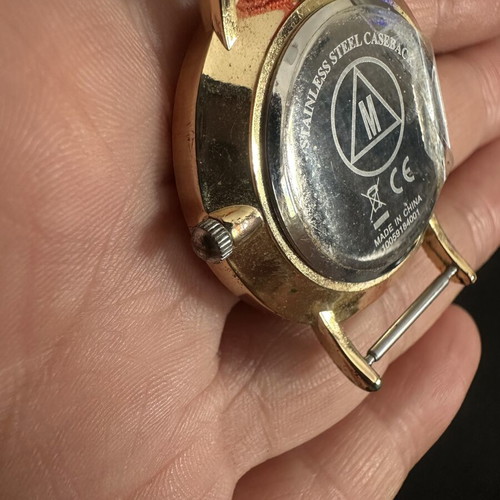 Fashion watch with gold case and NATO fabric strap
