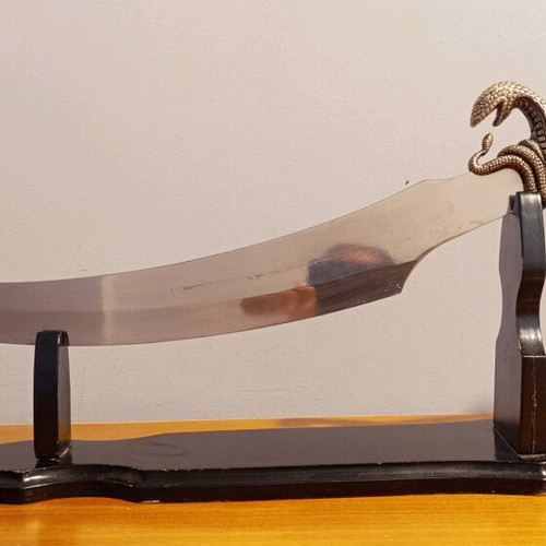 Decorative Gothic sword like new with wooden base