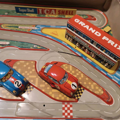 Race track toy with 3 wind-up cars used, 1960, metal