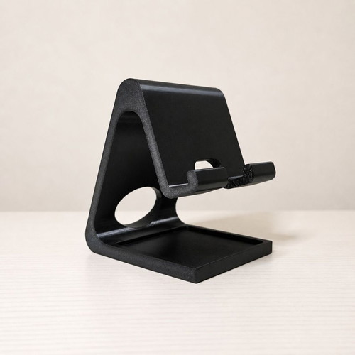 3D Phone Stand with Earphone Holder like new