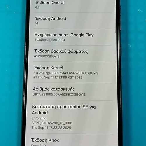 Samsung Galaxy A52s 5G smartphone used with cracked screen, Android 14