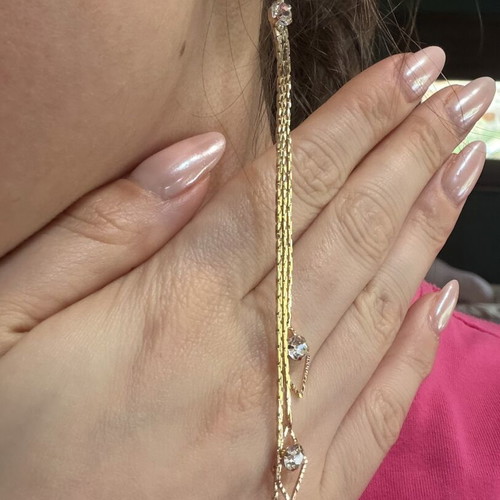 Dangling earrings with zircon, new, gold color