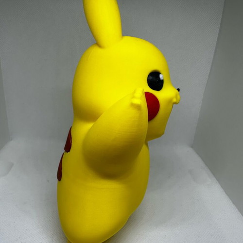 Pikachu figure like new in dynamic pose, height 19cm