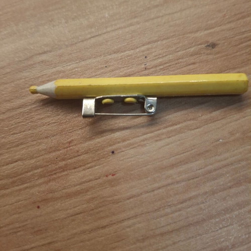 Yellow pin brooch