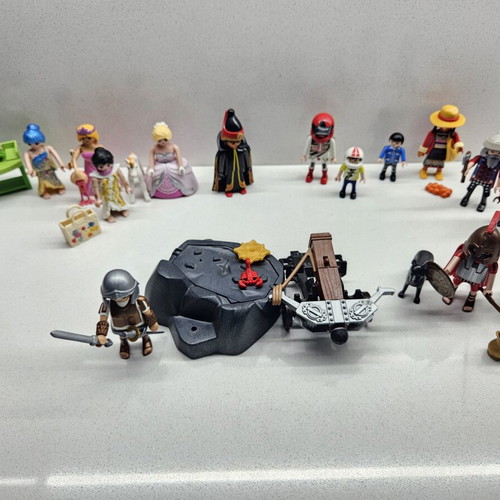 Playmobil figures set like new with catapult and accessories