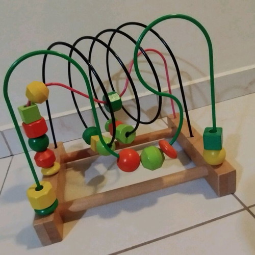 Wooden educational toy like new with wooden base