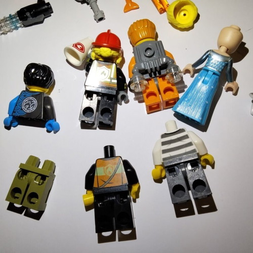 Lego figures, accessories and pieces used, all together