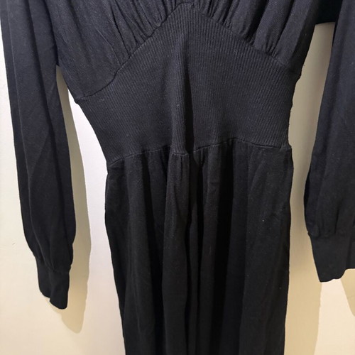 Sisley black mini dress used, size small with elastic fit