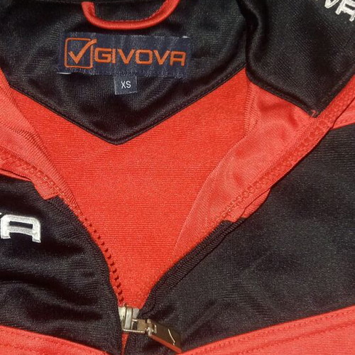 Sports jacket like new, red with sewn logos