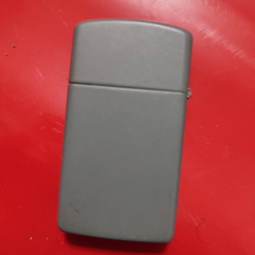 Slim Zippo lighter used, collectible (1989)