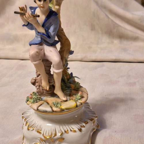 Capodimonte porcelain boy with flute like new with artist signature