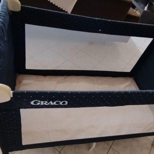 Baby playpen used with handle, dimensions 1.25x0.65x0.84 m