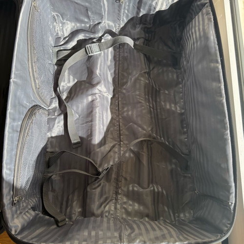 Delsey Black Medium Suitcase used with wheels
