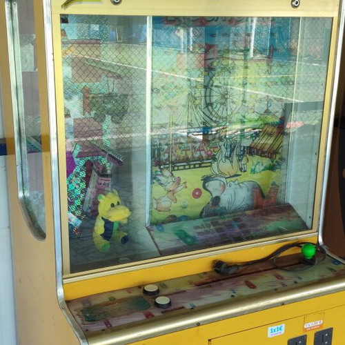 Children's machine with coin acceptor used