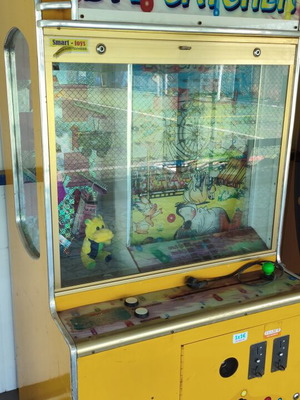 Children's machine with coin acceptor used