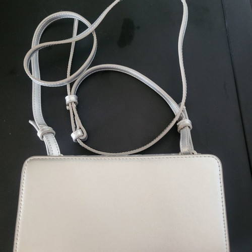 Calvin Klein silver bag like new with logo