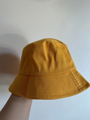 Hat new, orange with adjustable cords