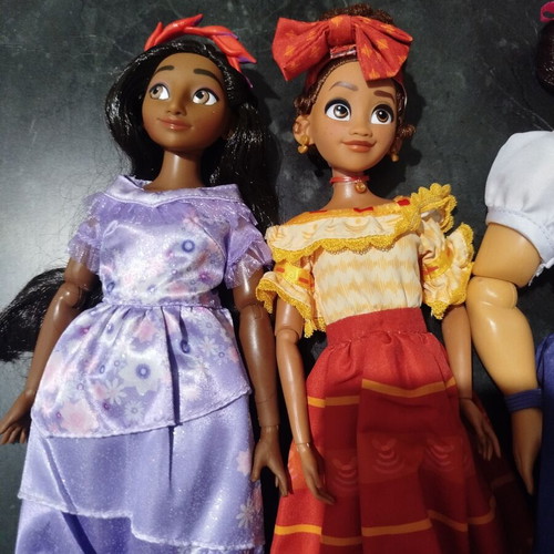 Disney Store Encanto dolls like new, all together