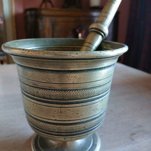 Antique brass mortar used with subtle design