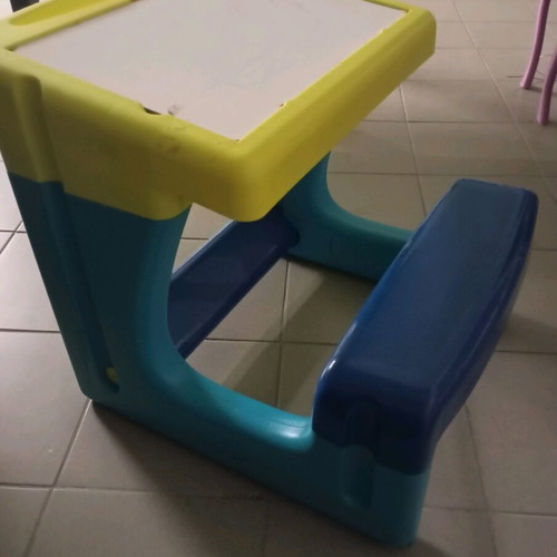 Desk used for child with board and storage space
